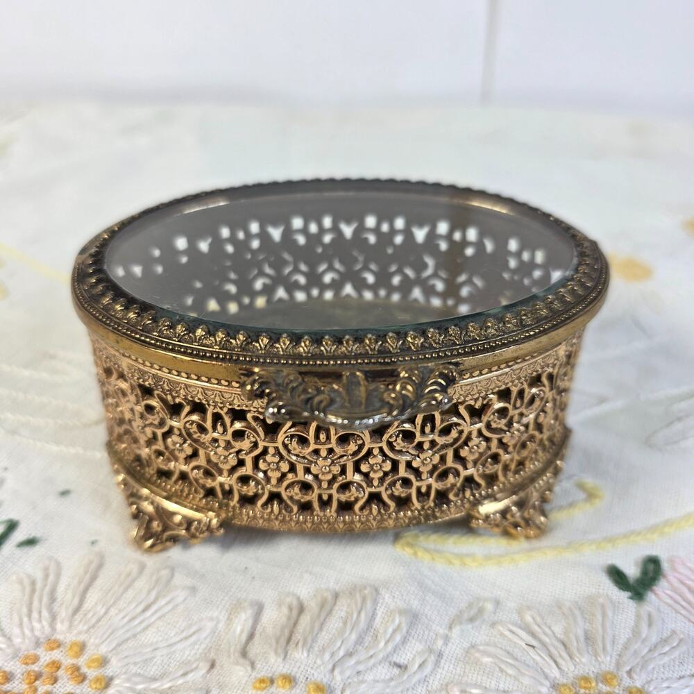 Vintage Gold Tone Filigree Jewelry Casket Trinket Box Oval Glass Lid Vanity Box